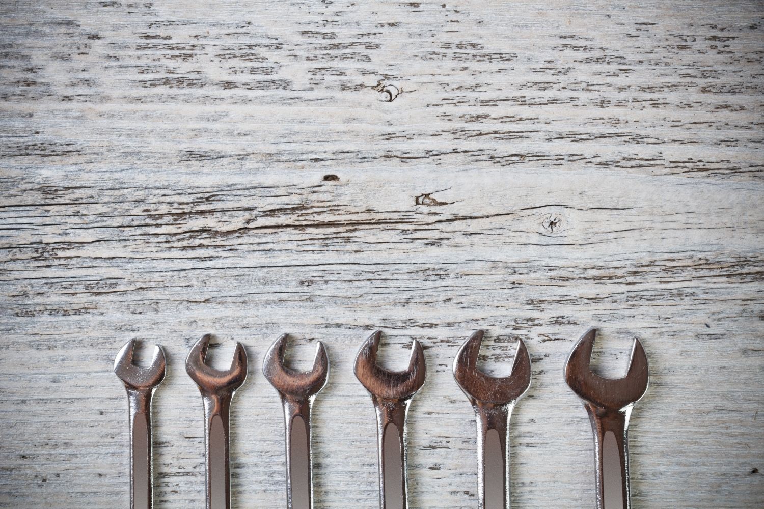 A row of spanners on a table